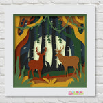 Two deer in a woods layered craft made with cardstock in fall colors 